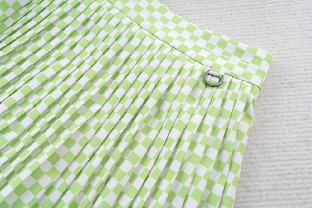 Breathable Sleeveless Golf Polo and Green Pleated Skirt Set